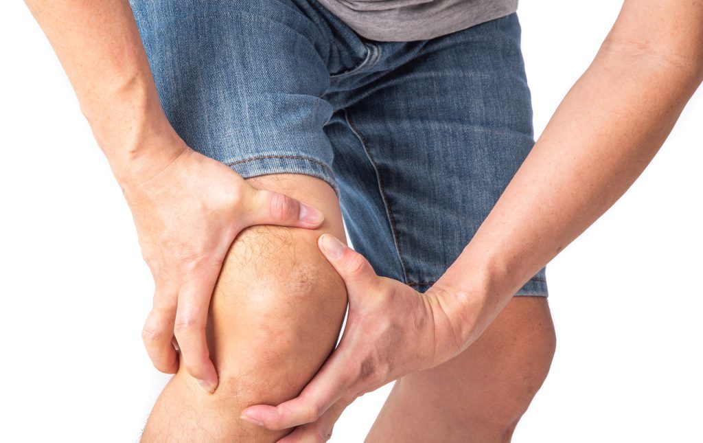 Joint injuries, Area of the injury, the image on a clean background. spasm on the man's knee.